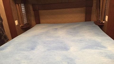 A memoryfoam mattress that's discoloured and may need to be replaced due to the gel going bad