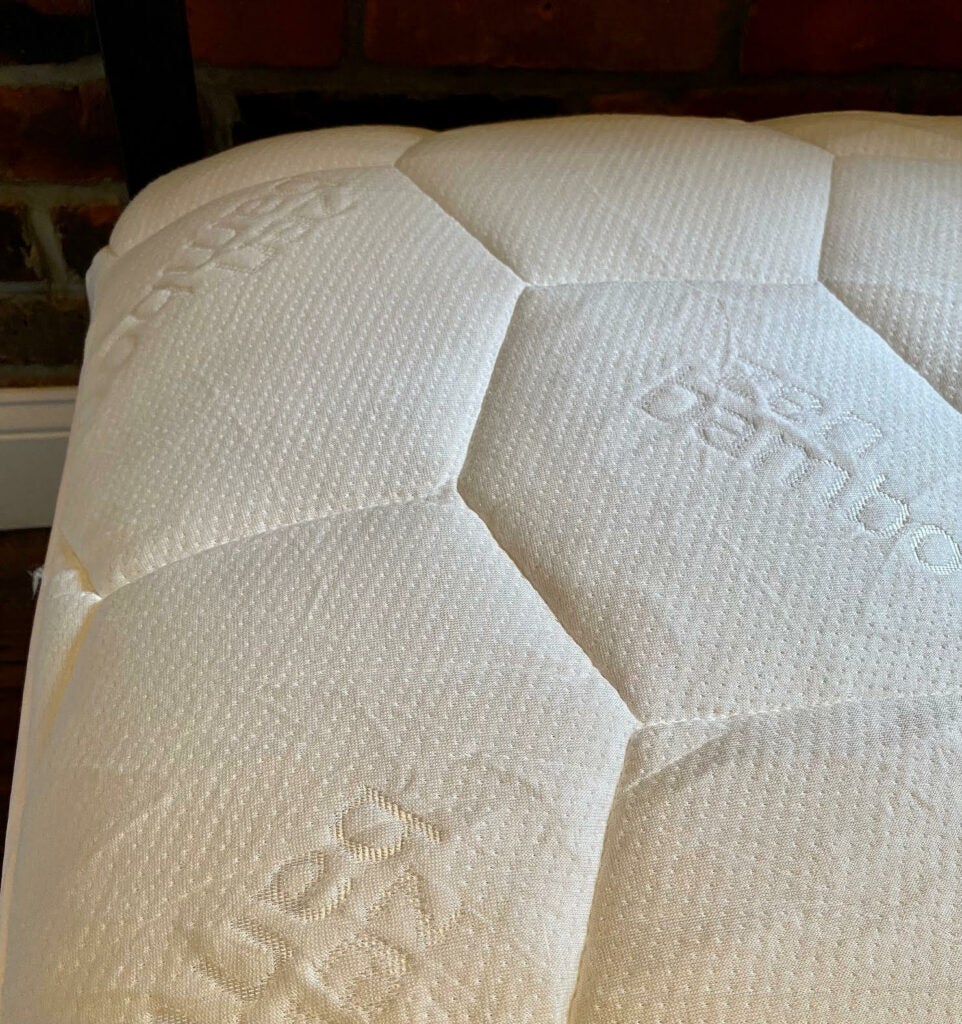 Close-up of Zen Bamboo mattress pad on a mattress