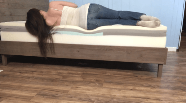 woman sleeping on her side on a casper mattress