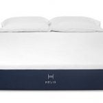 helix mattress, purple bottom and plush pillow top with two pillows on it