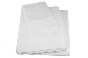 Grande Hotel sheets - white sheets folded in half in a pile