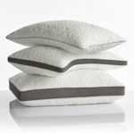 ComfortFit Pillows stacked ontop of each other, gray and white