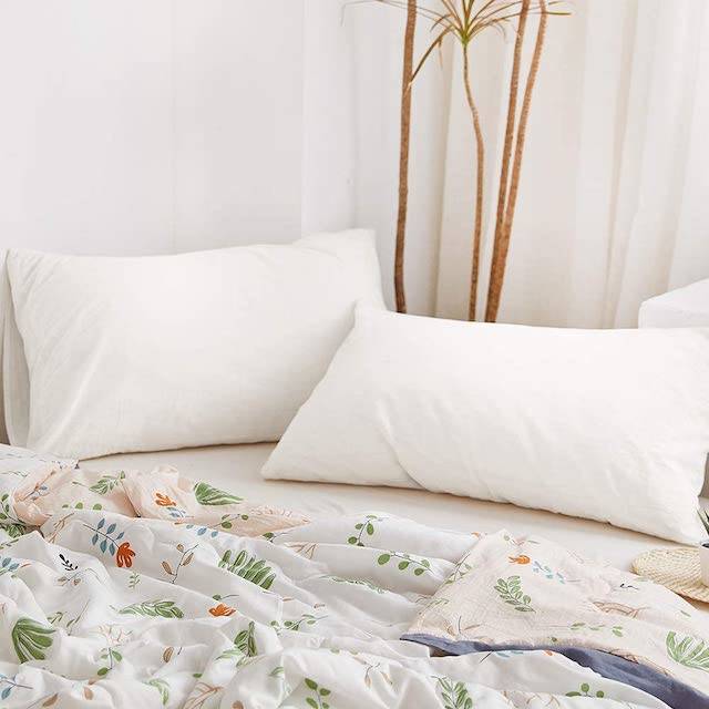 White pillowcases are the perfect solution to all your matching woes, and keeping a stack in your linen closet will solve the majority of your extra pillow issues.